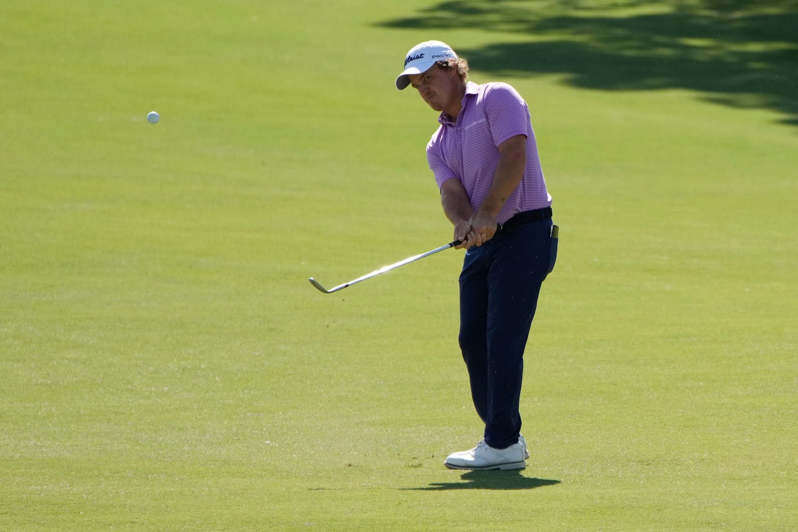 Bud Cauley chips onto the ninth green during the first round of Shriners Children's Open golf tournament Thursday, Oct. 17, 2024, in Las Vegas. (AP Photo/John Locher)