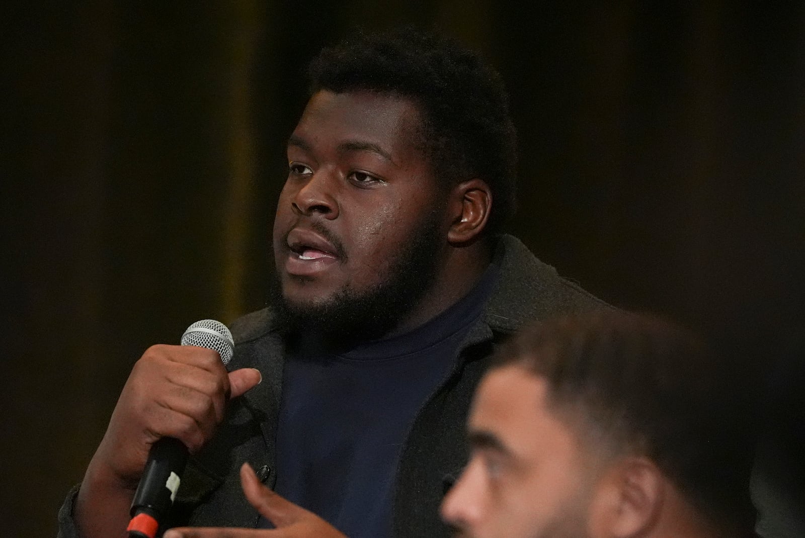 College football player Kardell Thomas speaks during a players association for college athletes meeting ahead of the college football's national title game, Saturday, Jan. 18, 2025, in Atlanta. (AP Photo/Brynn Anderson)