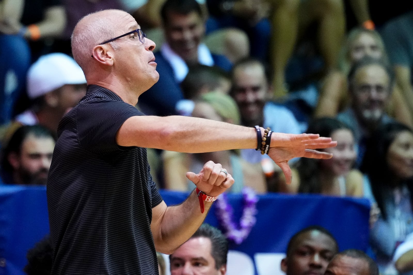 UConn head coach Dan Hurley instructs players from the sideline during the first half of an NCAA college basketball game against Dayton at the Maui Invitational Wednesday, Nov. 27, 2024, in Lahaina, Hawaii. (AP Photo/Lindsey Wasson)