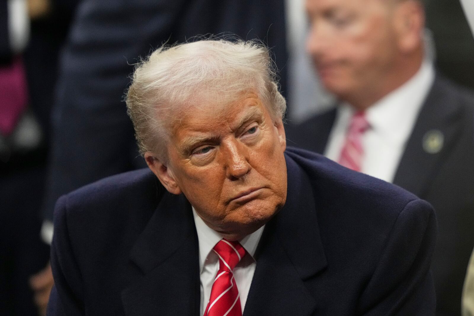 President Donald Trump attends the finals at the NCAA wrestling championship, Saturday, March 22, 2025, in Philadelphia. (AP Photo/Matt Rourke)