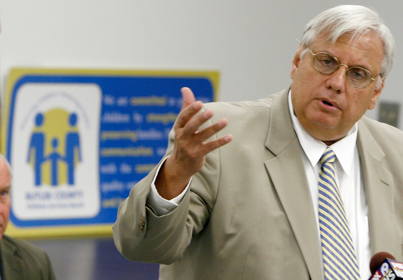 Former Butler County politician Mike Fox died on Thursday, June 23, 2022. He was 73. Pictured is at a 2007 press conference when he was named the executive director of Butler County Children Services. FILE