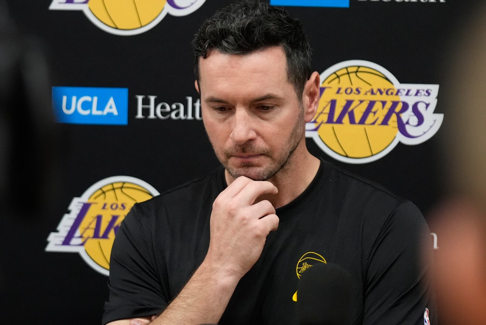 Los Angeles Lakers coach JJ Redick recounts that he and his family lost their house in the deadly Pacific Palisades wildfire during an NBA basketball news conference at the UCLA Health Training Center in El Segundo, Calif., Friday, Jan. 10, 2025. (AP Photo/Damian Dovarganes)