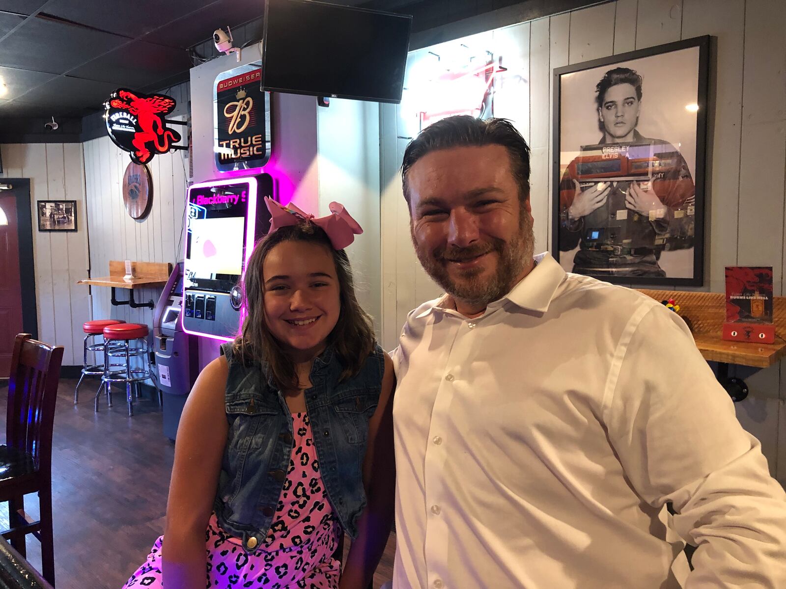 Matt Pater, new owner of Arches Saloon, and his daughter, Cassidy Pater, 11, inside the bar, which he hopes to expand into a family restaurant and bar. MIKE RUTLEDGE/STAFF