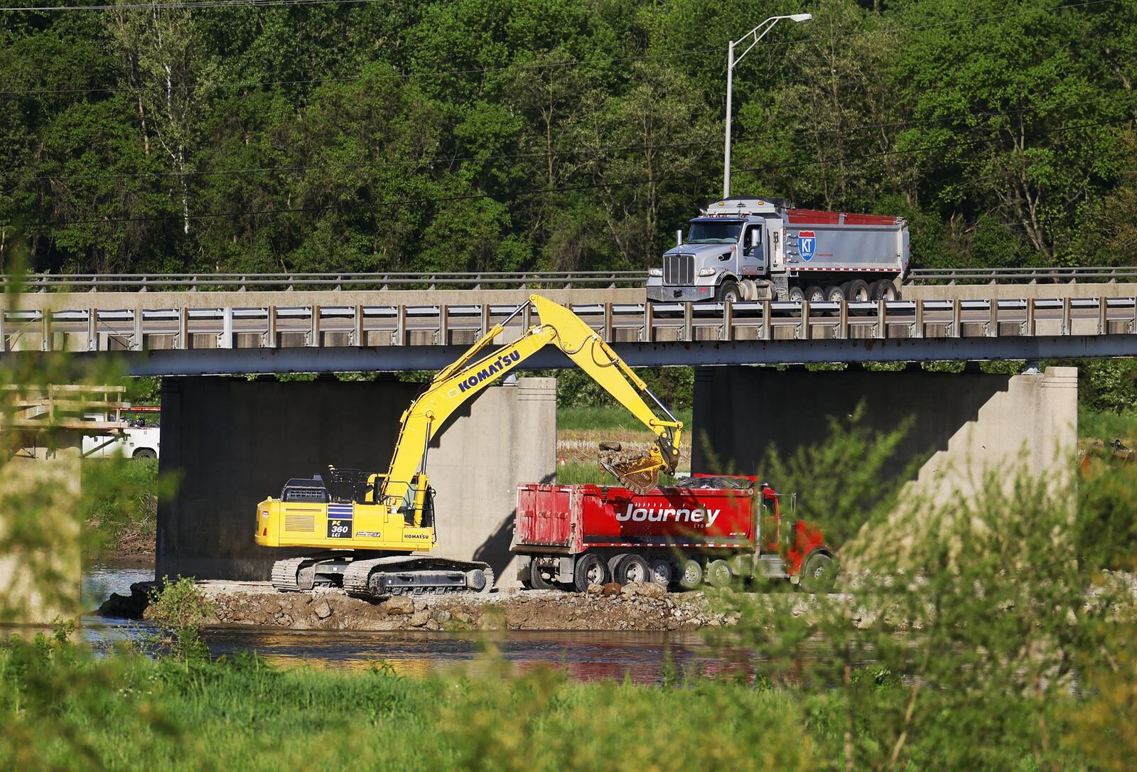 Workers are preparing the Ohio 122 bridge over the Great Miami River for construction set to begin Monday. The bridge that connects Middletown to Madison Twp. will be closed for 45 days, according to the Ohio Department of Transportation. NICK GRAHAM/STAFF