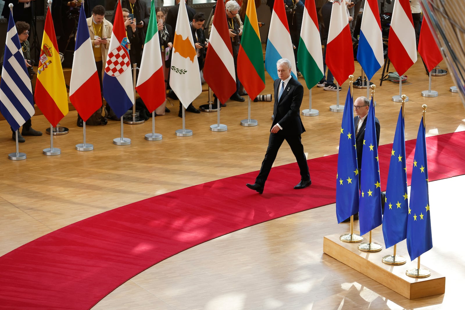 Lithuania's President Gitanas Nauseda arrives for an EU Summit at the European Council building in Brussels, Thursday, March 6, 2025. (AP Photo/Geert Vanden Wijngaert)