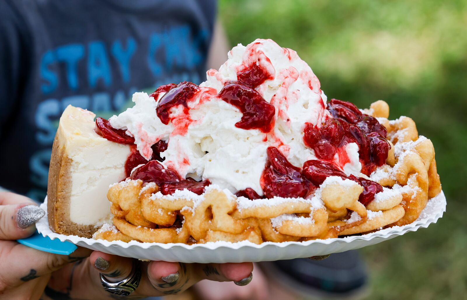 Strawberry cheesecake funnel cake at the Butler County Fair Friday, July 29, 2022. NICK GRAHAM/STAFF