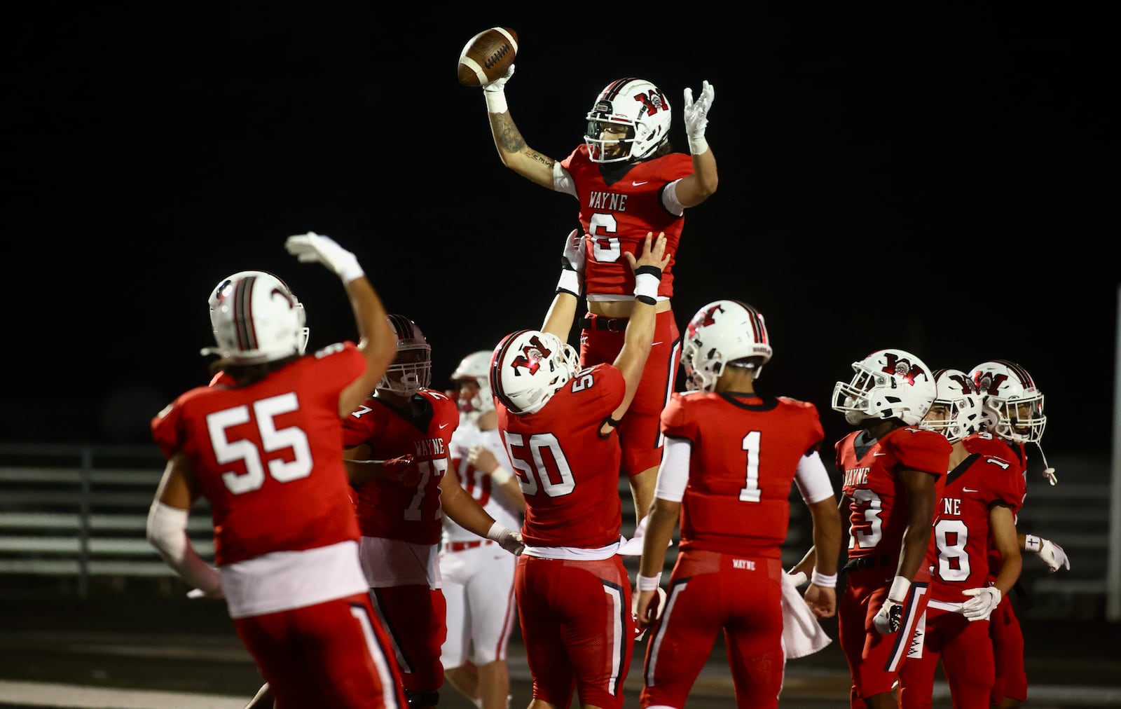 Wayne's Gage Miesse celebrates a touchdown against Fairfield on Friday, Aug.18, 2023, at Heidkamp Stadium in Huber Heights. David Jablonski/Staff