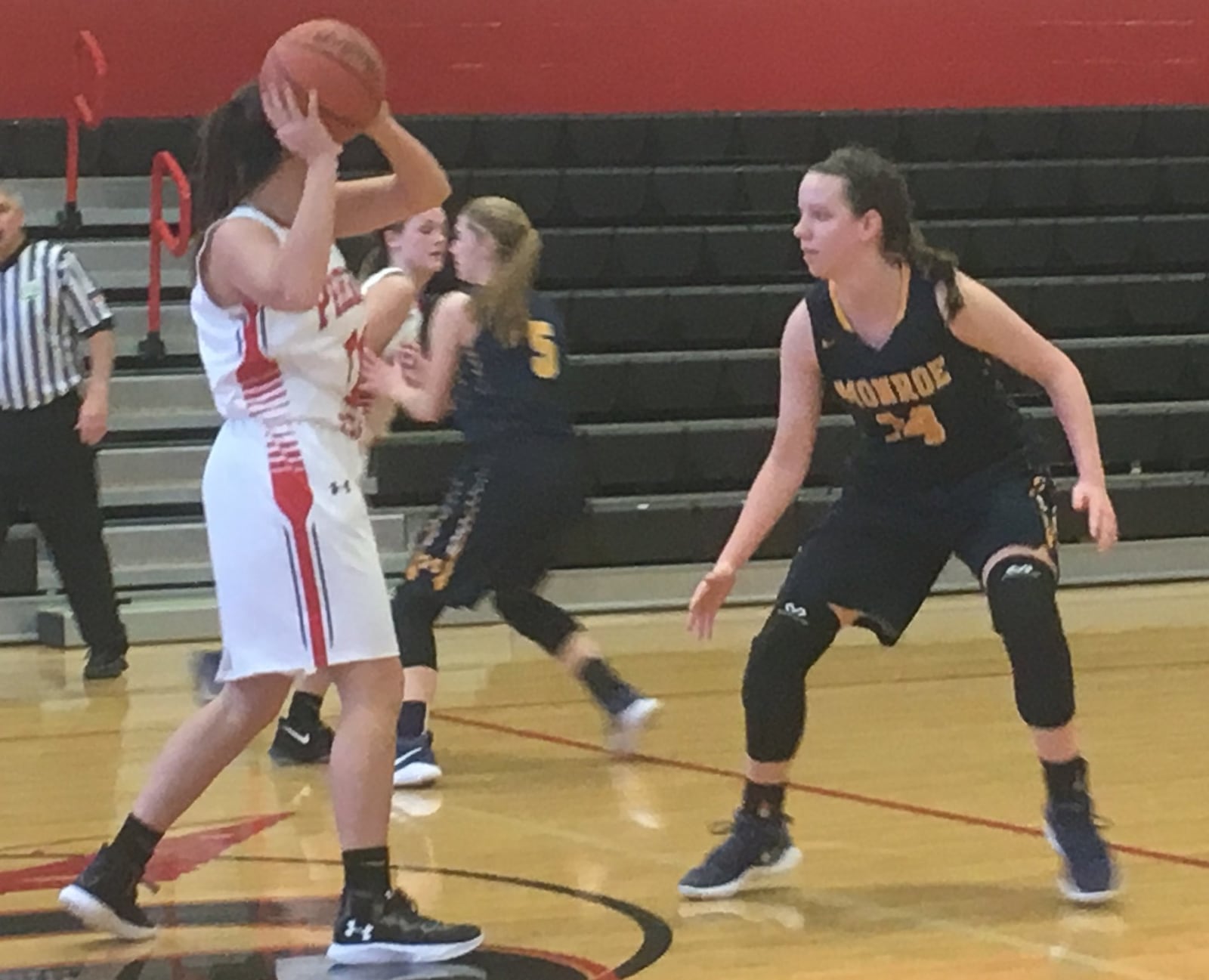 Monroe’s Sophie Sloneker (14) guards Preble Shawnee’s Brenna Woodard (11) during a game in Camden on Jan. 6, 2018. Shawnee won 55-51. RICK CASSANO/STAFF