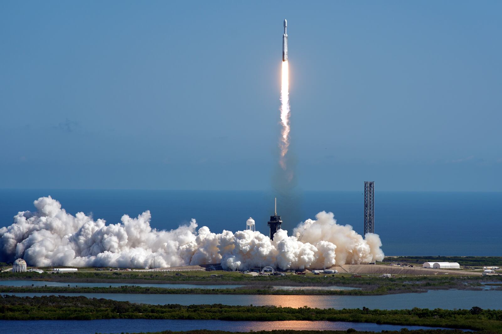 A SpaceX Falcon Heavy rocket with a NASA spacecraft bound for Jupiter lifts off from pad 39A at the Kennedy Space Center Monday, Oct. 14, 2024 in Cape Canaveral, Fla. (AP Photo/John Raoux)