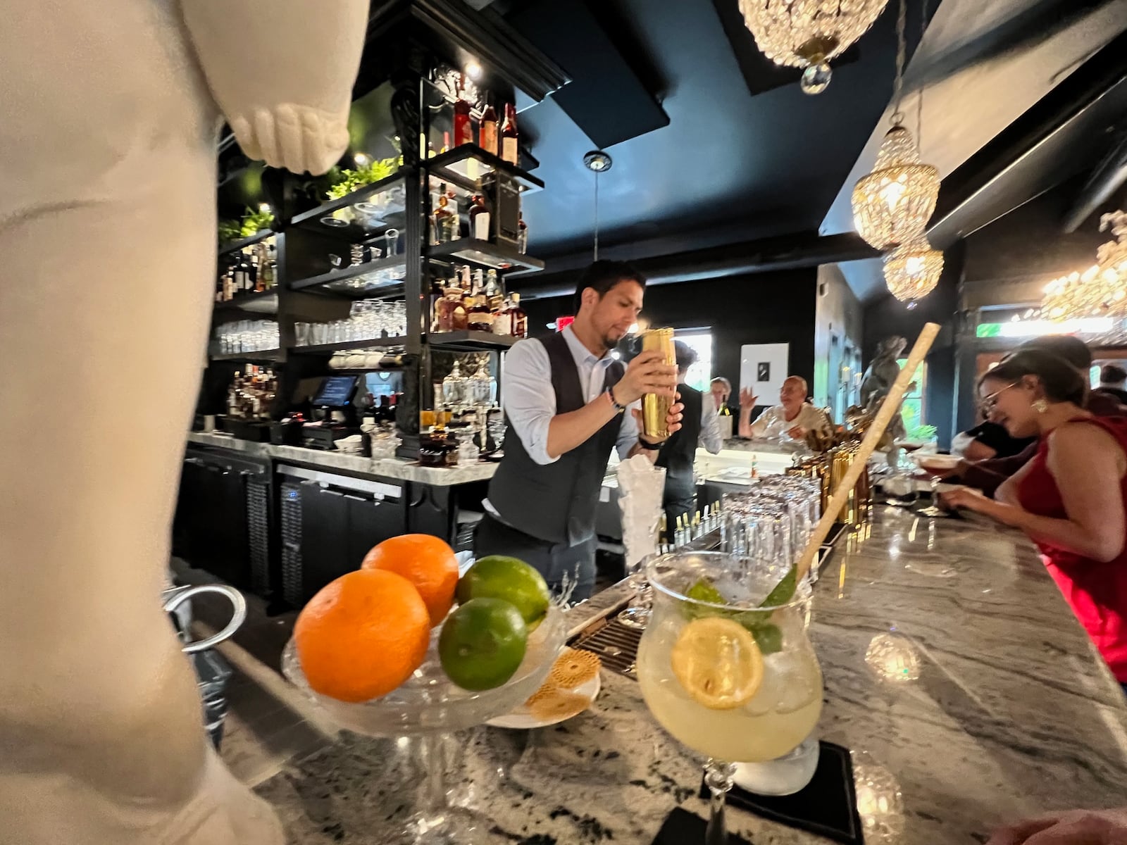 Patrons enjoy the bar at Manna in Centerville.