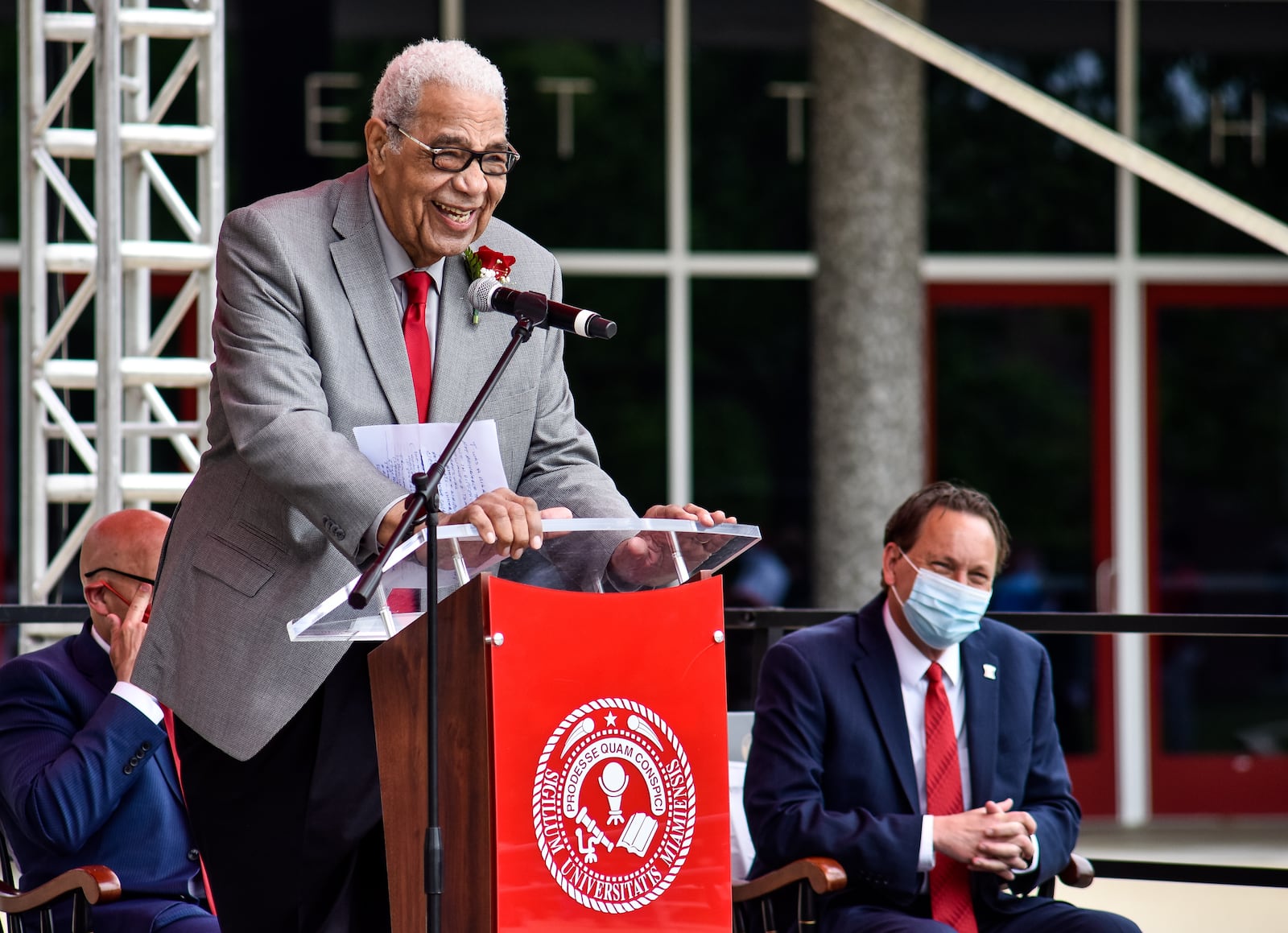 Wayne Embry speaks to a crowd during a ceremony and presentation of the Freedom Summer of '64 Award and unveiling of a statue in his honor Tuesday, May 18, 2021 at Miami University in Oxford. Wayne Embry and his late wife Theresa Embry, both Miami alumni, were awarded the Freedom of Summer of '64 Award for their life's work as civil right champions and mentors. A statue of Wayne Embry in a basketball pose, created by sculptor Tom Tsuchiya, was unveiled in front of Millett Hall and a scholarship in his name was announced to support Miami varsity men's basketball student athletes. NICK GRAHAM / STAFF