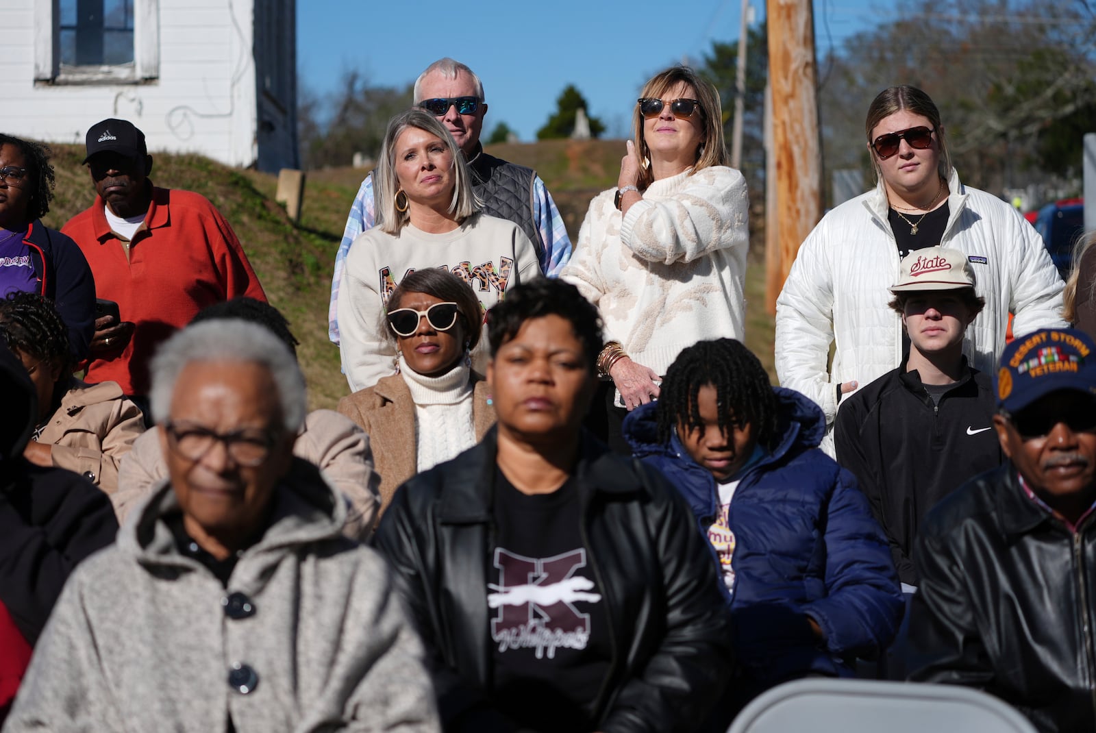 A crowd watch the unveiling of a Mississippi Department of Archives and History marker recognizing the birthplace and legacy of James Meredith, who became the first Black student to enroll at the University of Mississippi in 1962, Friday, Dec. 20, 2024, in Kosciusko, Miss. (AP Photo/Rogelio V. Solis)