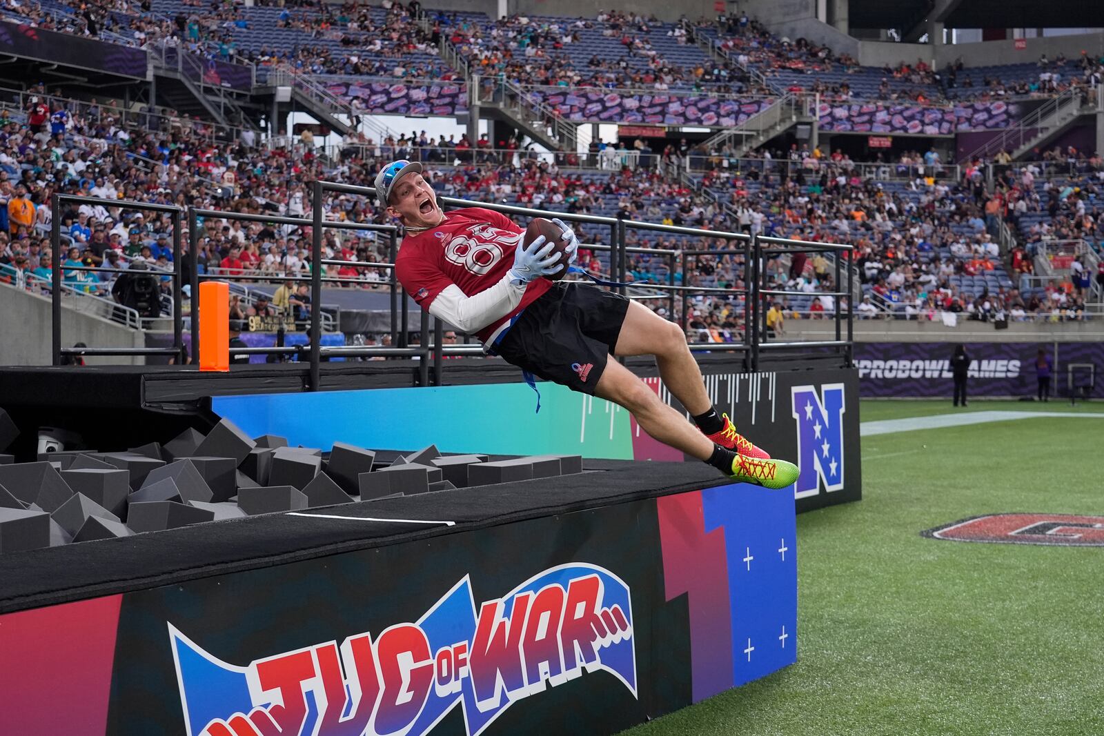 NFC tight end Trey McBride, of the Arizona Cardinals, celebrates after scoring a touchdown during the flag football event at the NFL Pro Bowl, Sunday, Feb. 2, 2025, in Orlando. (AP Photo/John Raoux)