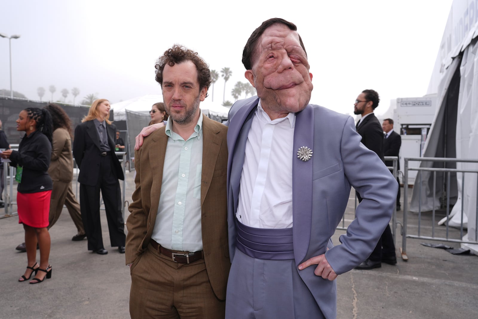 Aaron Schimberg, left, and Adam Pearson arrive at the Film Independent Spirit Awards on Saturday, Feb. 22, 2025, in Santa Monica, Calif. (AP Photo/Chris Pizzello)