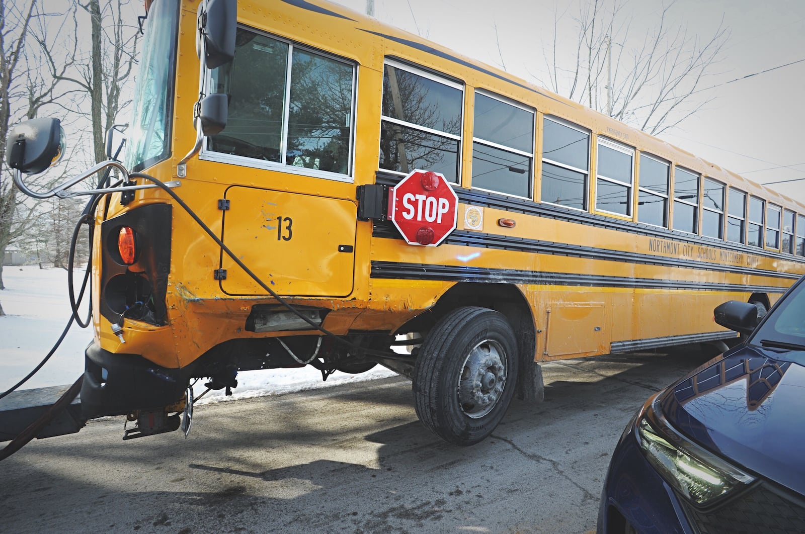 A Northmont City Schools bus crashed near the intersection of Brookville Phillipsburg and Sweet Potato Ridge roads Thursday morning. No children were injured during the crash. MARSHALL GORBY/STAFF