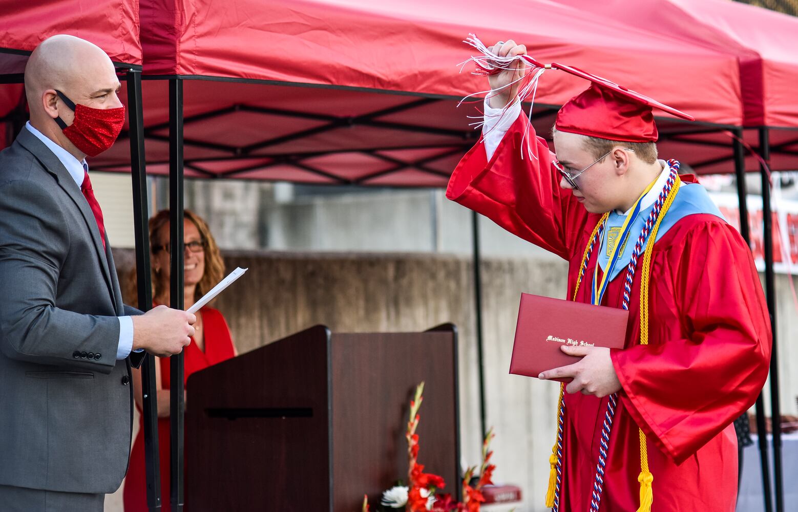 Madison High School drive-thru graduation ceremony at Land of Illusion