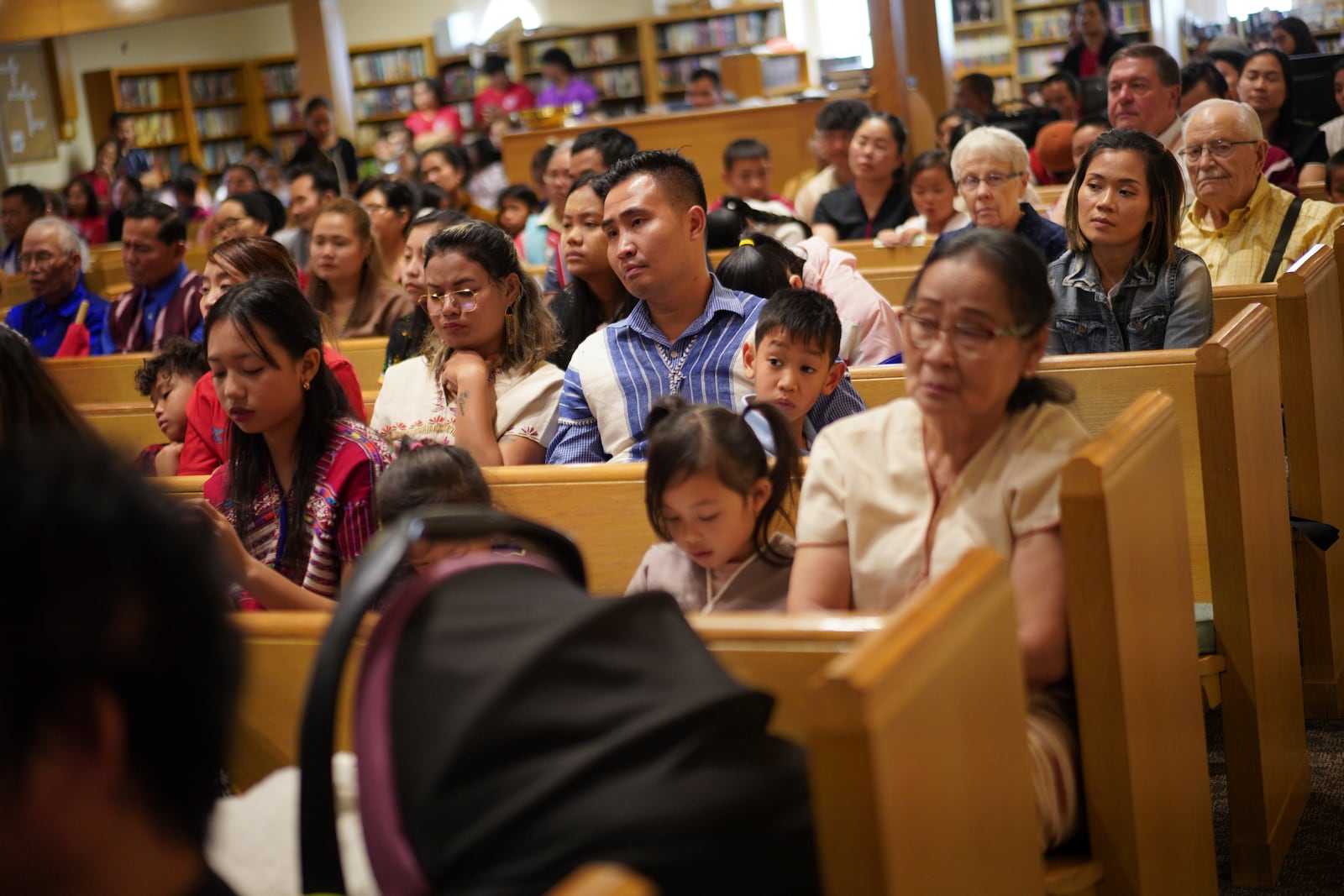 Parishioners attend a Karen-language service at Indian lake Baptist Church, while celebrating 15 years of partnership with the 150-year-old congregation founded by Swedish immigrants, in Worthington, Minn., on Sunday Oct. 20, 2024.