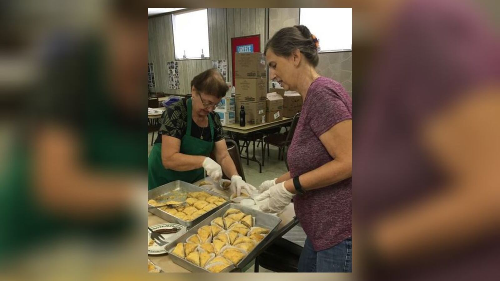 Middletown Greekfest volunteers, Georgia Papakirk, left, and Angie Stamper prepare pastries for the event Saturday at Sts. Constantine & Helen Greek Orthodox Church, 2500 Grand Ave. SUBMITTED PHOTO