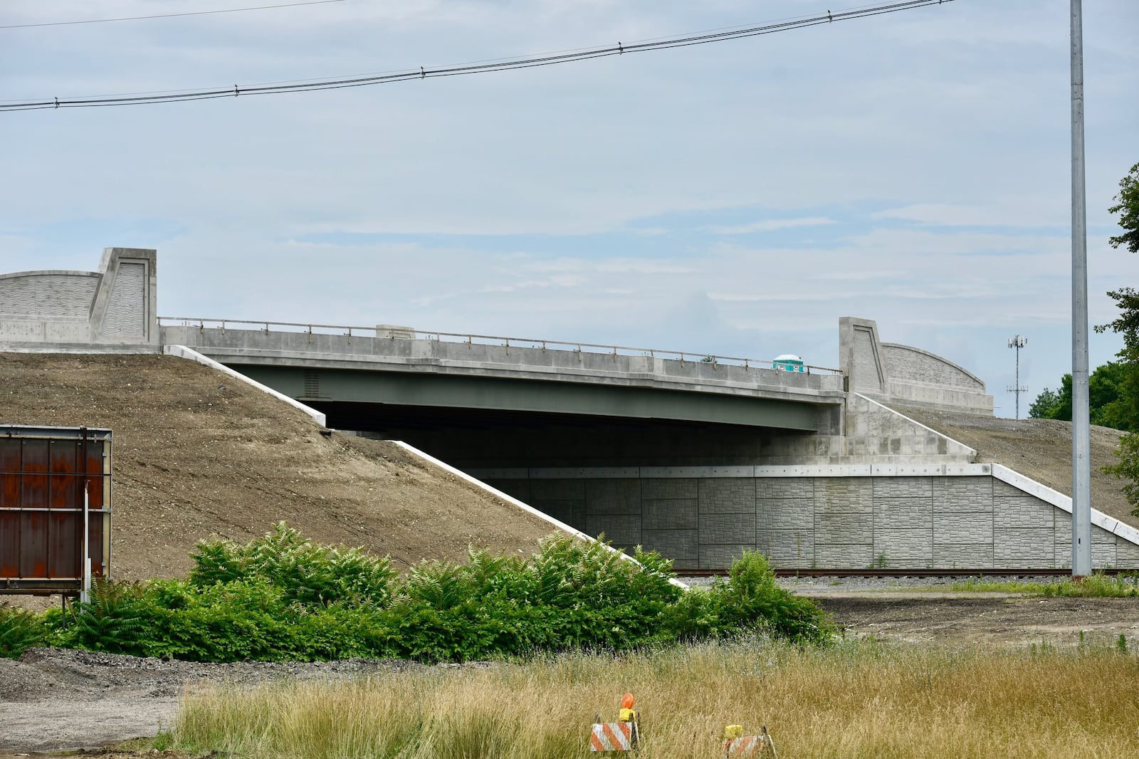 The long-awaited South Hamilton Crossing, sought for more than a century, still has a lot of work to go before it opens, probably in November. 