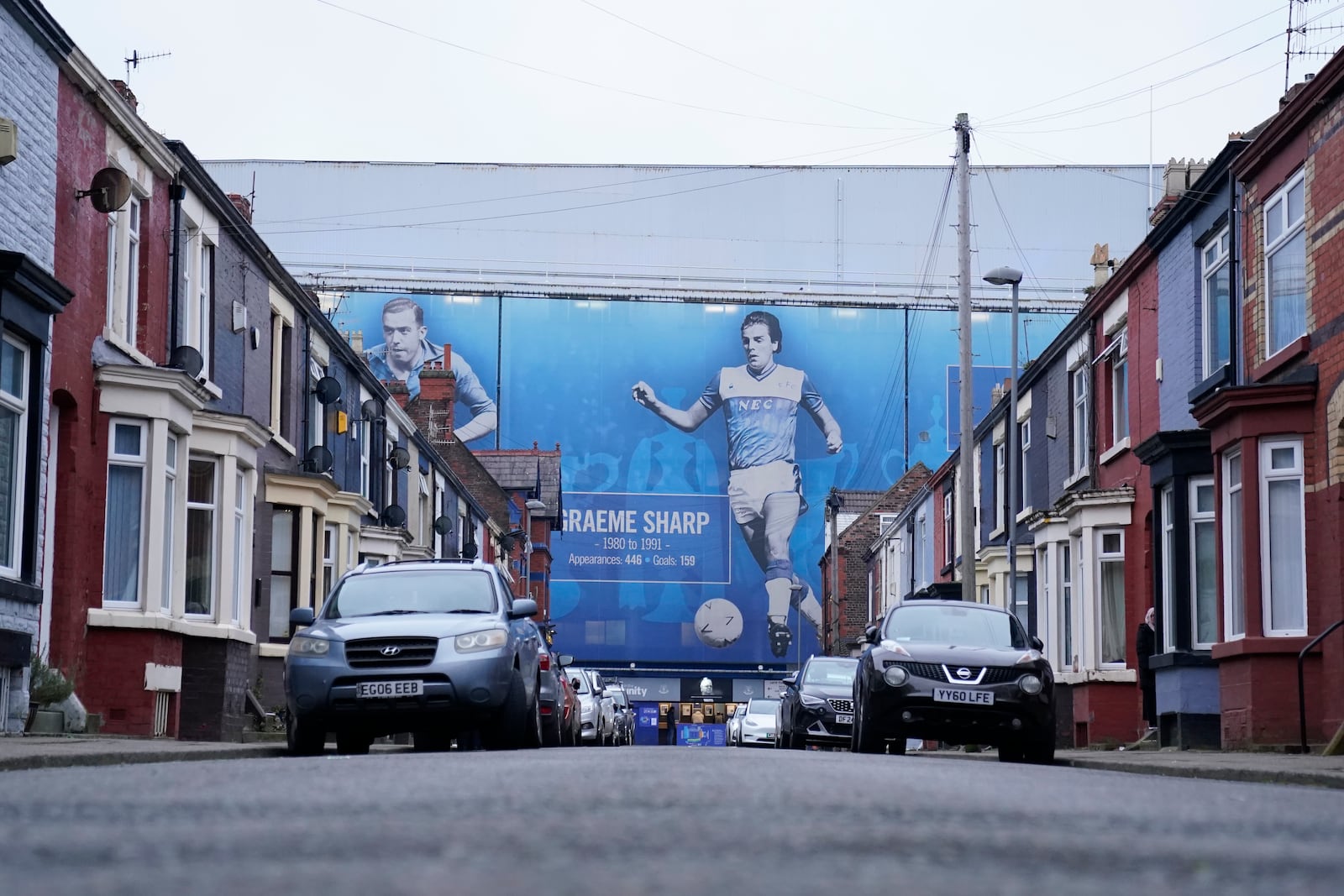 Cars are parking outside of the of Goodison Park stadium ahead of the English Premier League soccer match between Everton and Liverpool, Liverpool, England, Wednesday, Feb.12, 2025. (AP Photo/Dave Thompson)