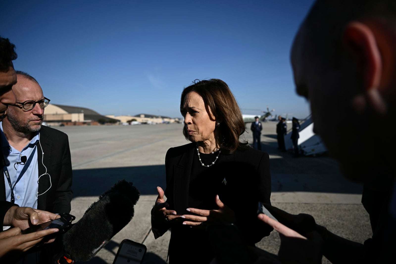 Democratic presidential nominee Vice President Kamala Harris talks to reporters before boarding Air Force Two, Wednesday, Oct. 30, 2024, at Joint Base Andrews, Md. (Brendan Smialowski/Pool via AP)