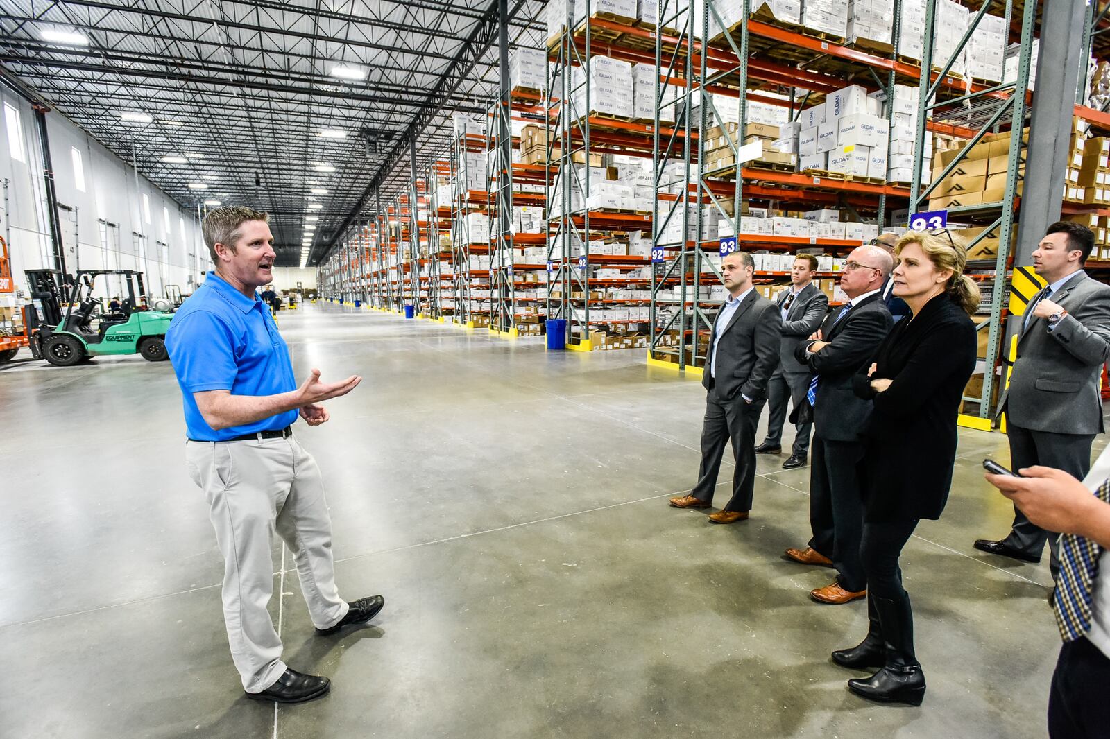 Dan Kessler, vice president of operations for TSC Apparel, gives a tour of their facility inside the new West Chester Trade Center at the corner of Ohio 747 and Union Centre Boulevard Wednesday, April 1 in West Chester Township. The first two buildings are up and some tenants are already moved in. Buildings one and two make up a little over 600,000 square feet of space. When completed, the seven building complex will be nearly 2 million square feet. NICK GRAHAM/STAFF