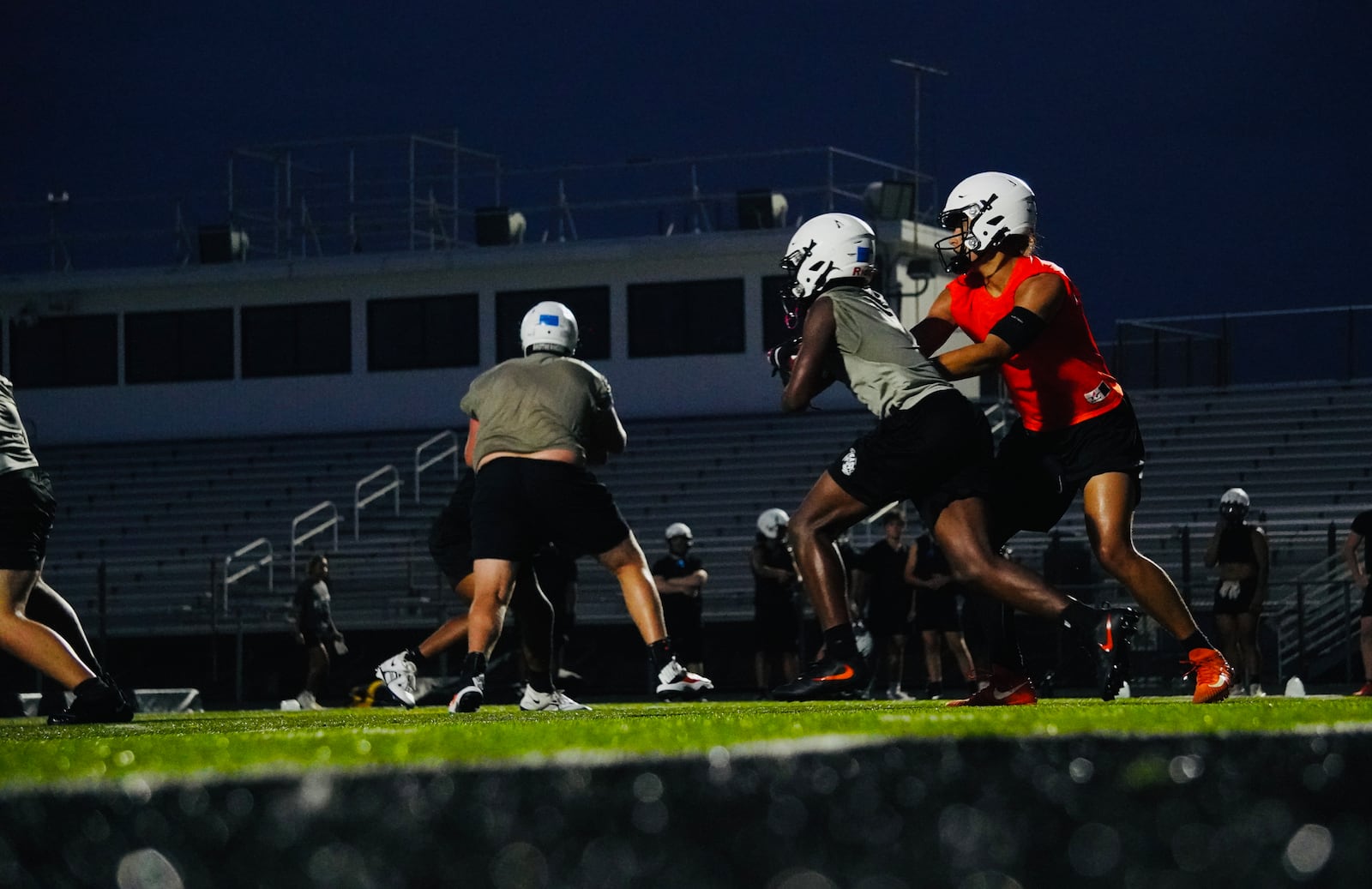 The Lakota East offense runs a play during practice on Wednesday, July 24, at Lakota East High School. Chris Vogt/CONTRIBUTED