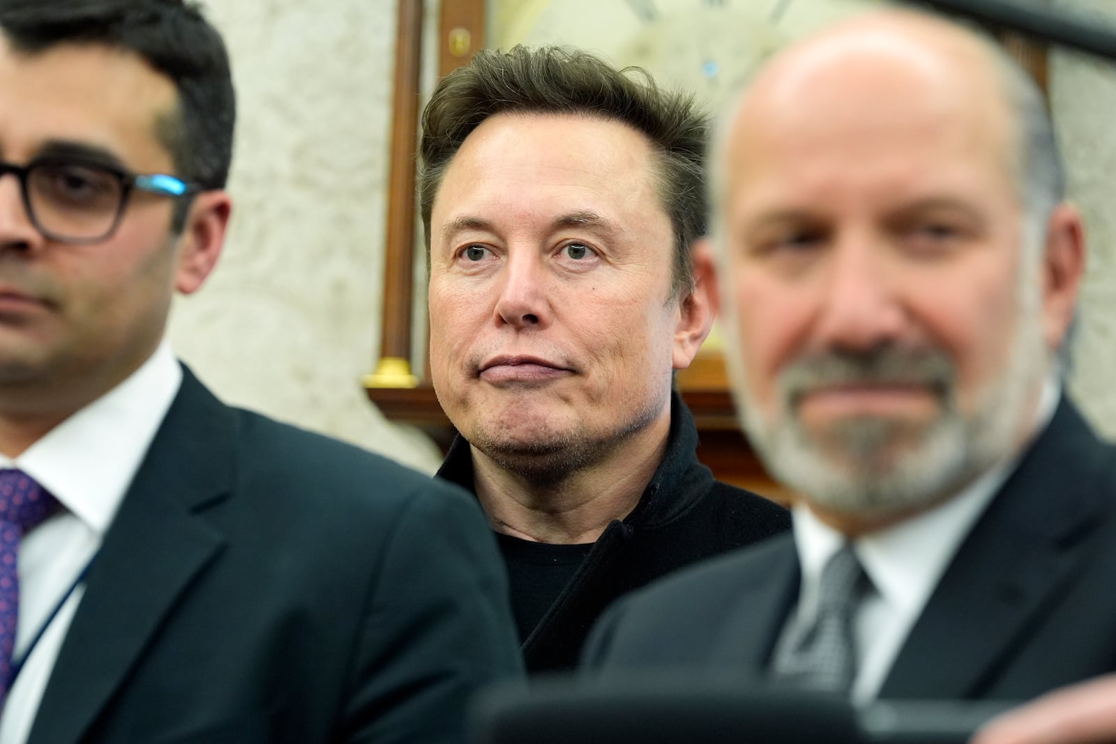 FILE - Elon Musk listens as President Donald Trump meets with India's Prime Minister Narendra Modi in the Oval Office of the White House, Thursday, Feb. 13, 2025, in Washington. (Photo/Alex Brandon,File)