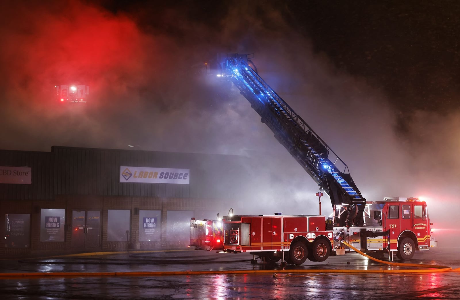 Fire crews from multiple departments battle a fire at Kittyhawk Plaza on Marie Drive Wednesday, Dec. 11, 2024 in Middletown. NICK GRAHAM/STAFF