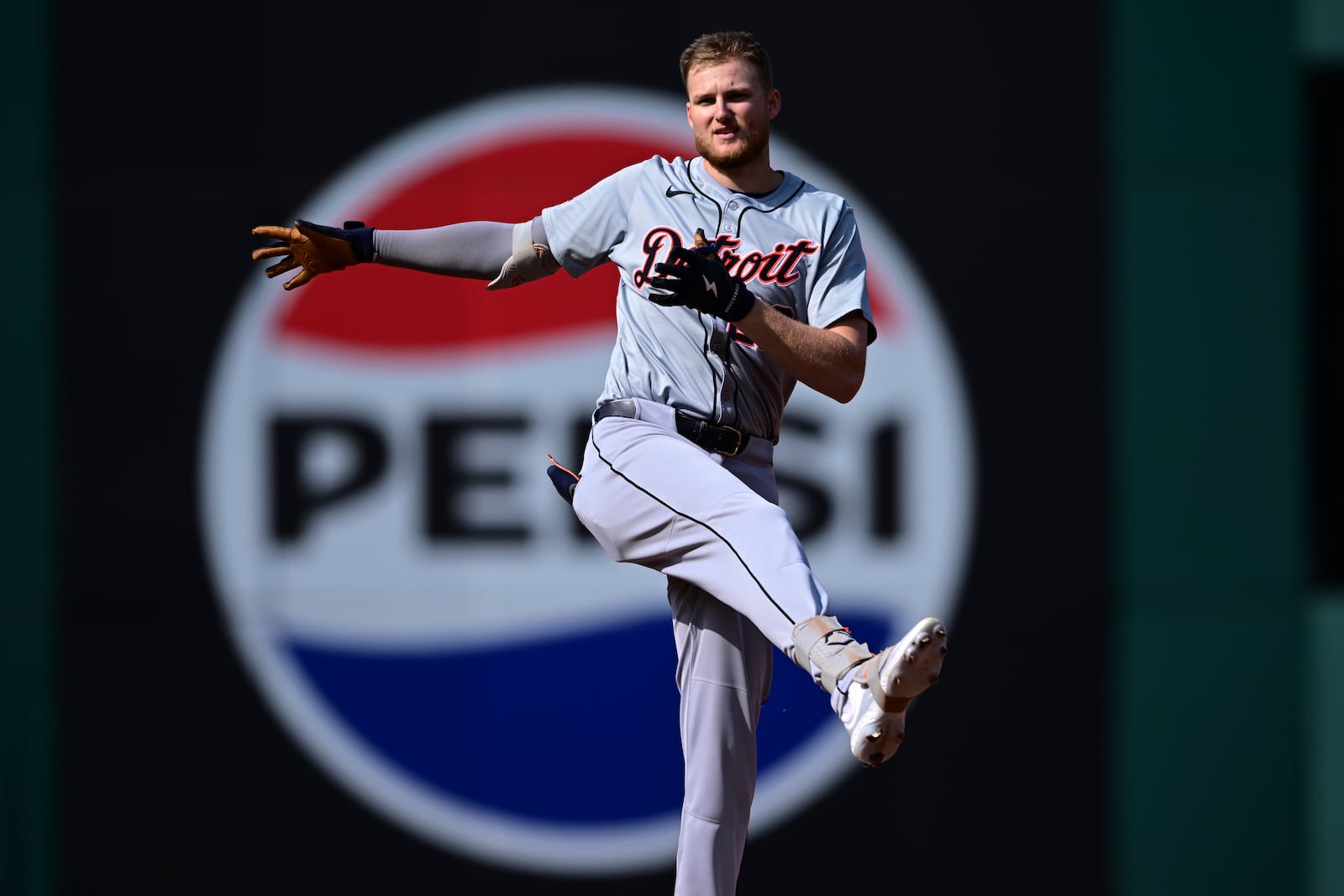 Detroit Tigers' Parker Meadows celebrates at second base after hitting a double in the second inning during Game 5 of baseball's American League Division Series against the Cleveland Guardians, Saturday, Oct. 12, 2024, in Cleveland. (AP Photo/David Dermer)