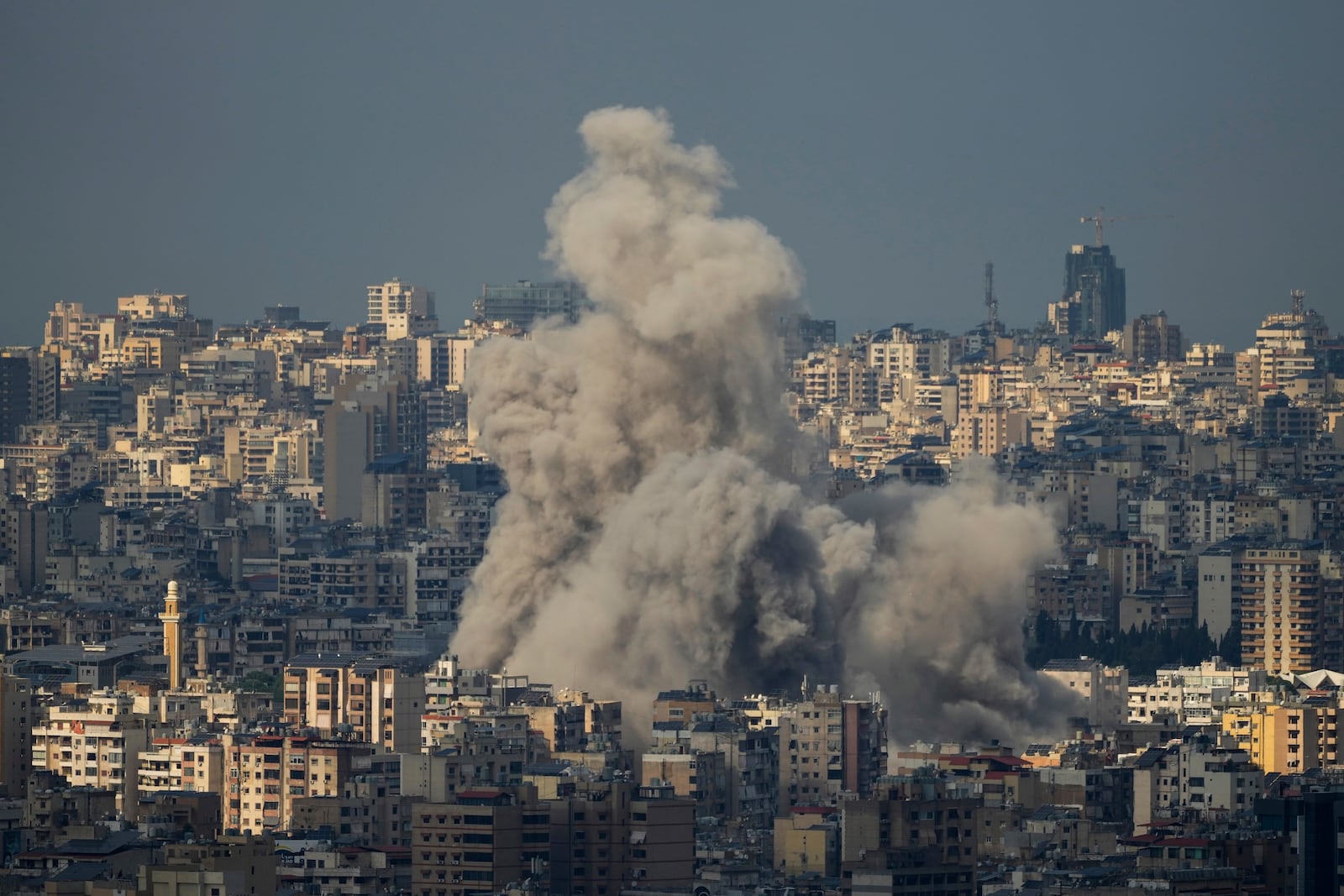 Smoke billows following Israeli airstrikes in Dahiyeh, Beirut, Lebanon, Wednesday, Nov. 13, 2024. (AP Photo/Hassan Ammar)