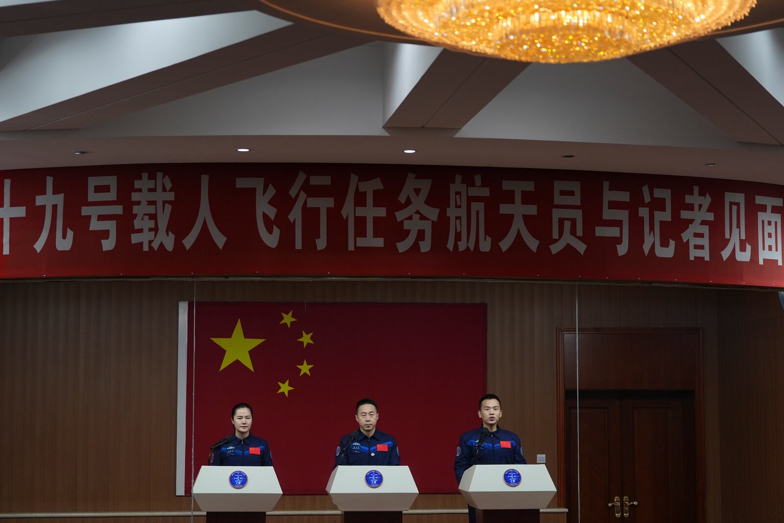 From left, Chinese astronauts Wang Haoze, Cai Xuzhe and Song Lingdong meet the press ahead of the Shenzhou-19 mission at the Jiuquan Satellite Launch Center in Jiuquan, northwestern China Tuesday, Oct. 29, 2024. (AP Photo/Ng Han Guan)