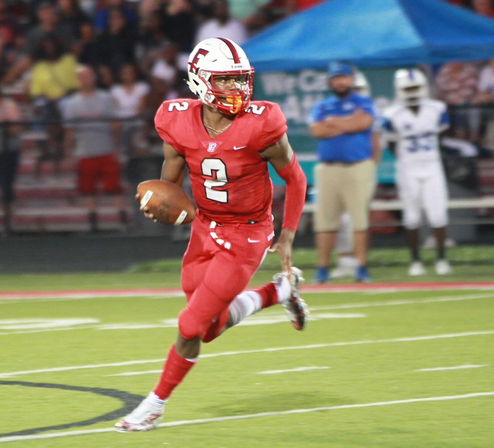 Fairfield senior QB Sawiaha Ellis (2) ranks No. 2 among GMC passing leaders. Fairfield defeated visiting Hamilton 34-27 in a Week 3 high school football game on Friday, Sept. 20, 2019. MARC PENDLETON / STAFF