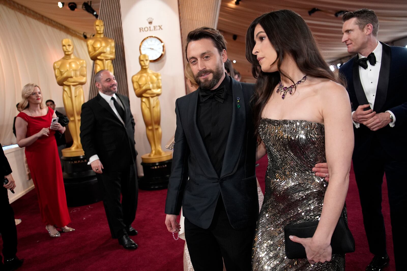 Kieran Culkin, left, and Jazz Charton arrive at the Oscars on Sunday, March 2, 2025, at the Dolby Theatre in Los Angeles. (AP Photo/John Locher)