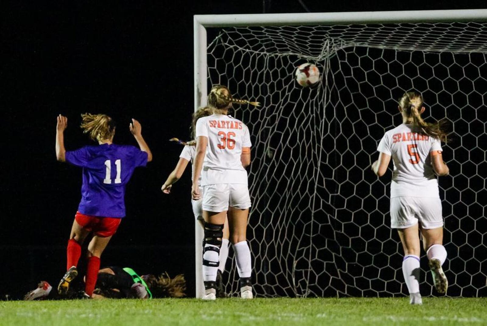 Fenwick’s Hope Evans (11) scores the only goal in a 1-0 victory over visiting Waynesville on Monday night in Middletown. NICK GRAHAM/STAFF