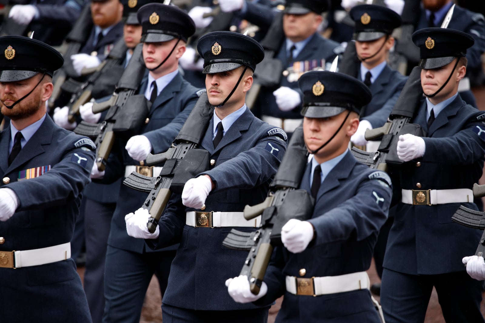 FILE - Soldiers march in a procession after the coronation ceremony of Britain's King Charles III and Queen Camilla in London, Saturday, May 6, 2023. (AP Photo/David Cliff, FILE)