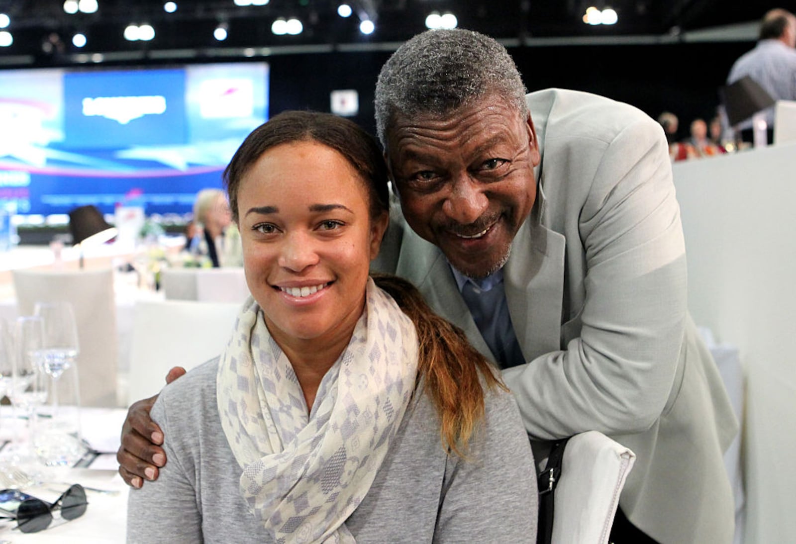 BET founder Robert Johnson poses with daughter Paige Johnson after she won the Airbus Grand Prix class as part of the Longines Los Angeles Masters at Los Angeles Convention Center on September 28, 2014 in Los Angeles, California.  (Photo by David Buchan/Getty Images for Masters Grand Slam Indoor)