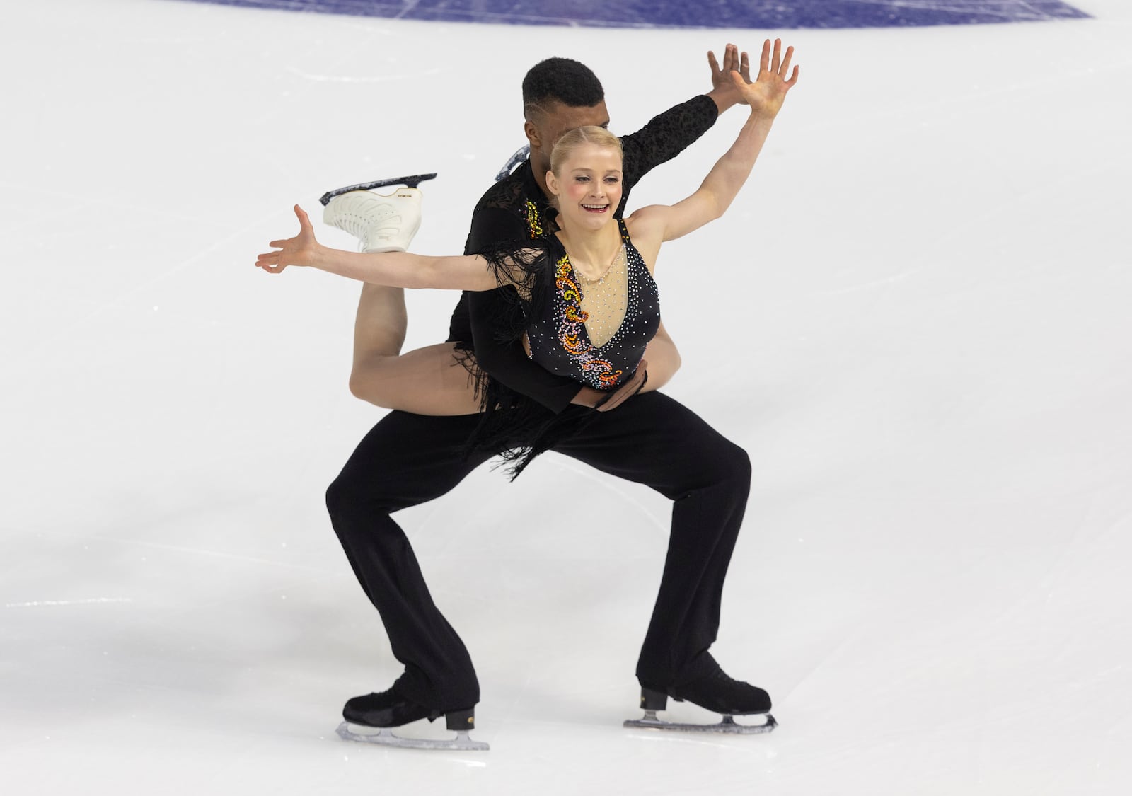 Nica Digerness, front, and Mark Sadusky perform during the pairs short program at the U.S. figure skating championships Thursday, Jan. 23, 2025, in Wichita, Kan. (AP Photo/Travis Heying)