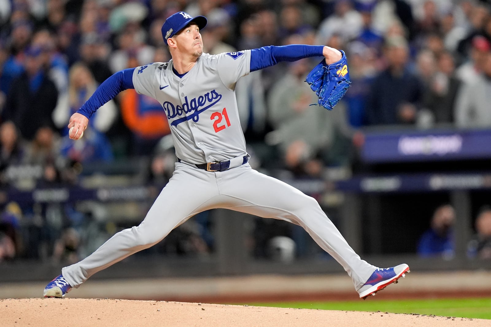 Los Angeles Dodgers pitcher Walker Buehler throws against the New York Mets during the first inning in Game 3 of a baseball NL Championship Series, Wednesday, Oct. 16, 2024, in New York. (AP Photo/Frank Franklin II)