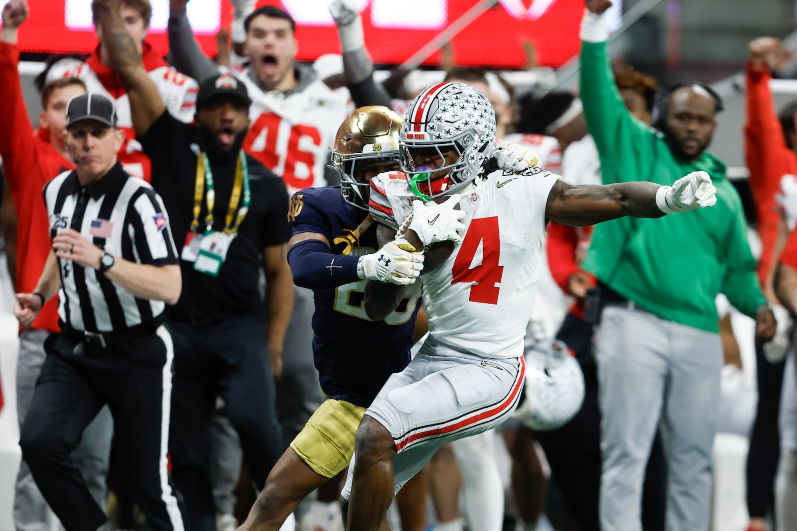 Ohio State wide receiver Jeremiah Smith catches a pass against Notre Dame during second half of the College Football Playoff national championship game Monday, Jan. 20, 2025, in Atlanta. (AP Photo/Butch Dill)