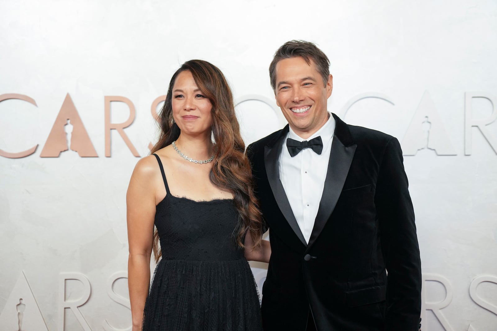 Samantha Quan, left, and Sean Baker arrive at the Oscars on Sunday, March 2, 2025, at the Dolby Theatre in Los Angeles. (AP Photo/Jae C. Hong)