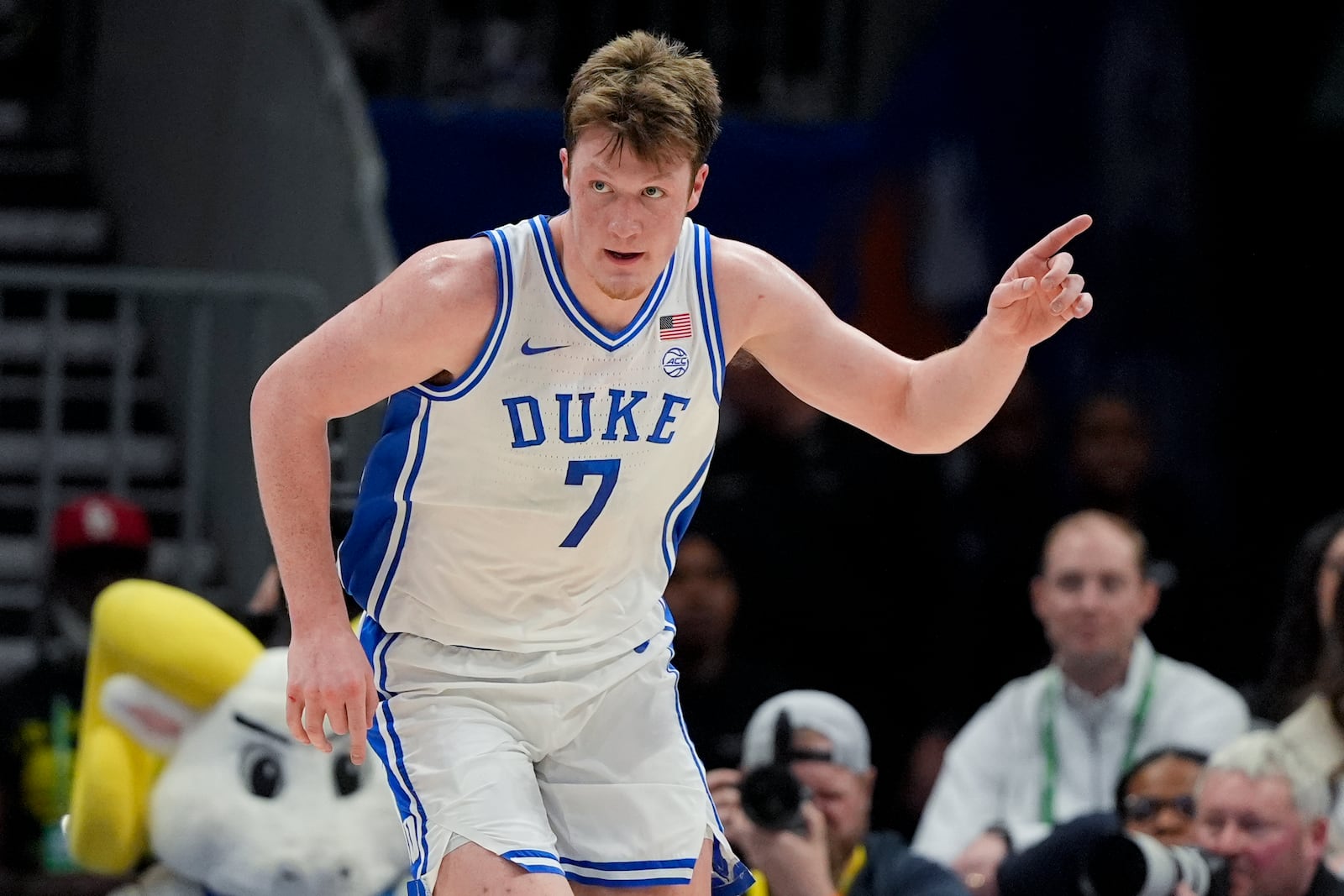 Duke guard Kon Knueppel celebrates after scoring against North Carolina during the first half of an NCAA college basketball game in the semifinals of the Atlantic Coast Conference tournament, Friday, March 14, 2025, in Charlotte, N.C. (AP Photo/Chris Carlson)