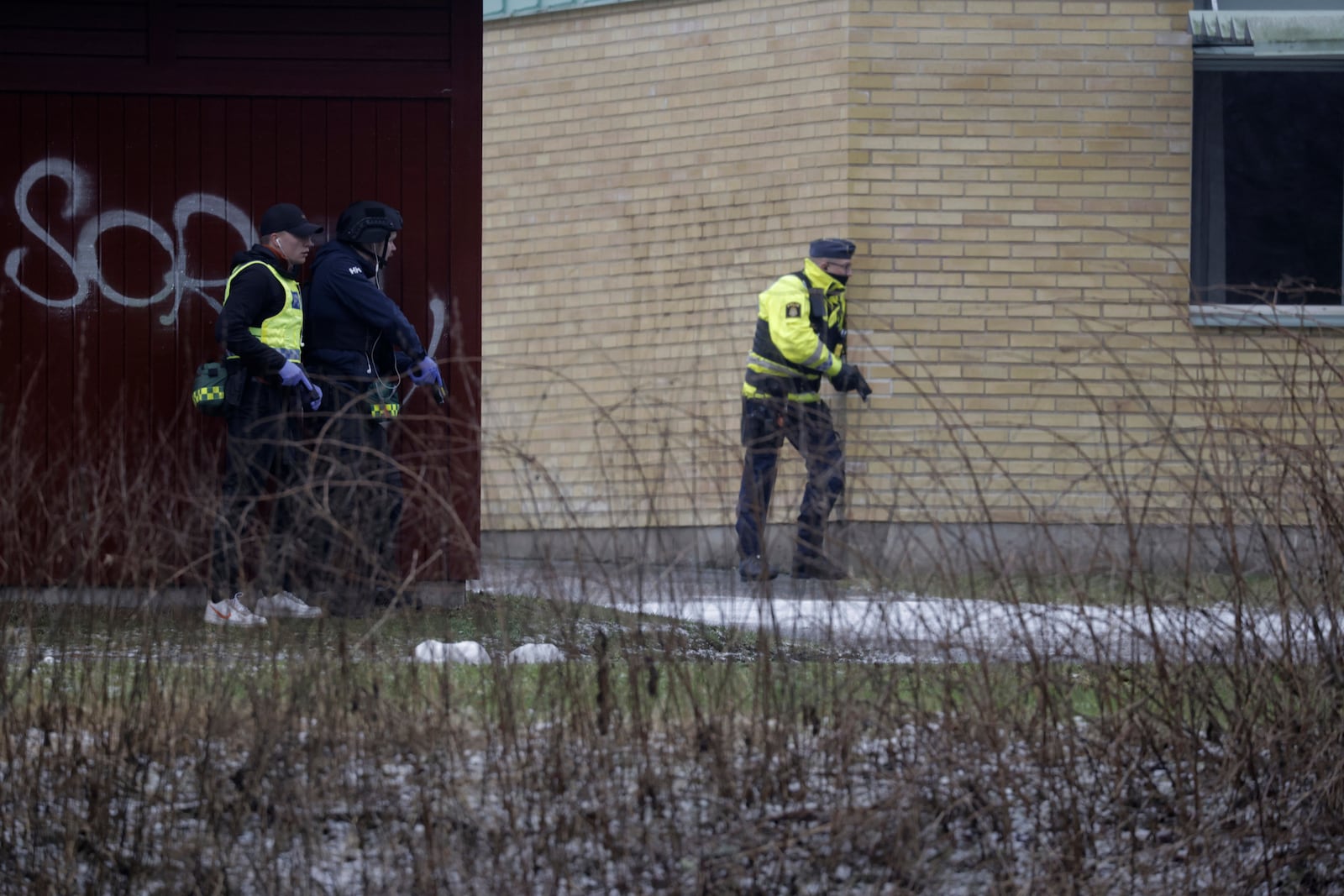 Police at the scene of an incident at Risbergska School, in Örebro, Sweden, Tuesday, Feb. 4, 2025. (Kicki Nilsson/TT News Agency via AP)