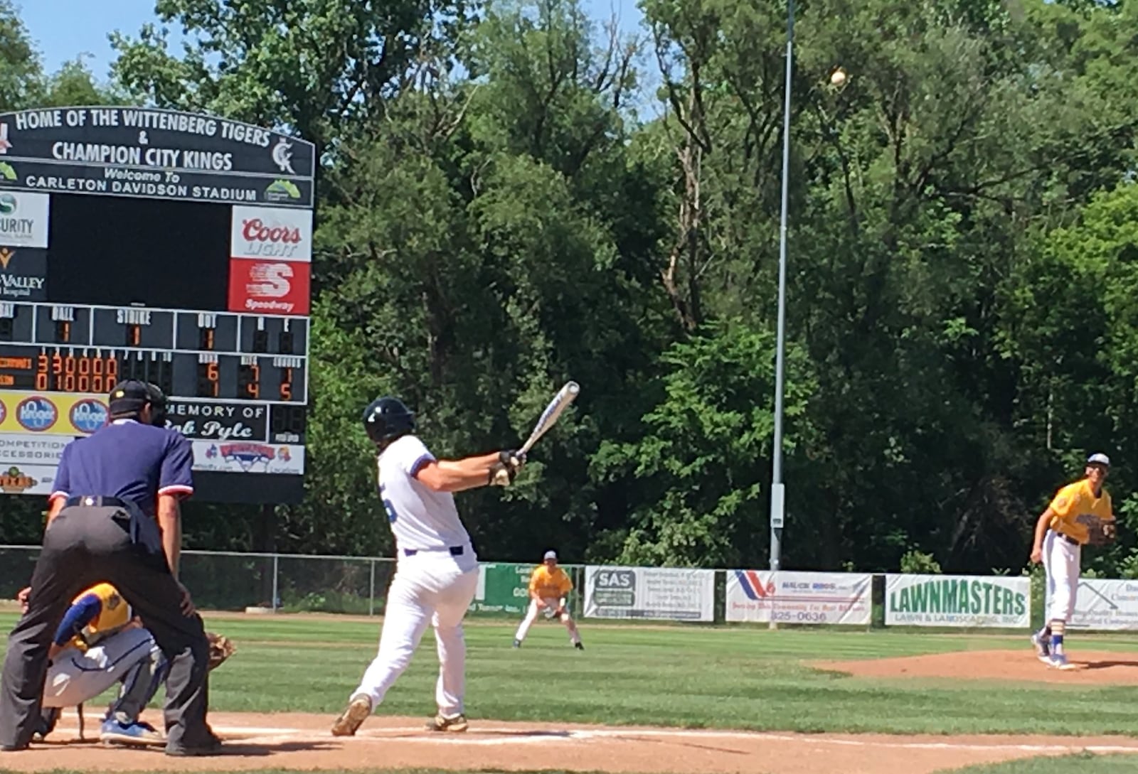 Cincinnati Christian’s Jacob Carroll singles in the seventh inning off Russia pitcher Jack Dapore on Thursday afternoon at Carleton Davidson Stadium in Springfield. Carroll had two hits and two RBIs in the Cougars’ 6-1 Division IV regional semifinal victory. RICK CASSANO/STAFF