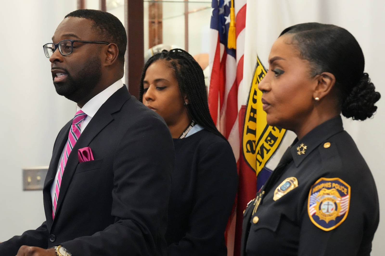 Mayor Paul Young, left, speaks during a news conference Thursday, Dec. 5, 2024, in Memphis, Tenn. (AP Photo/George Walker IV)