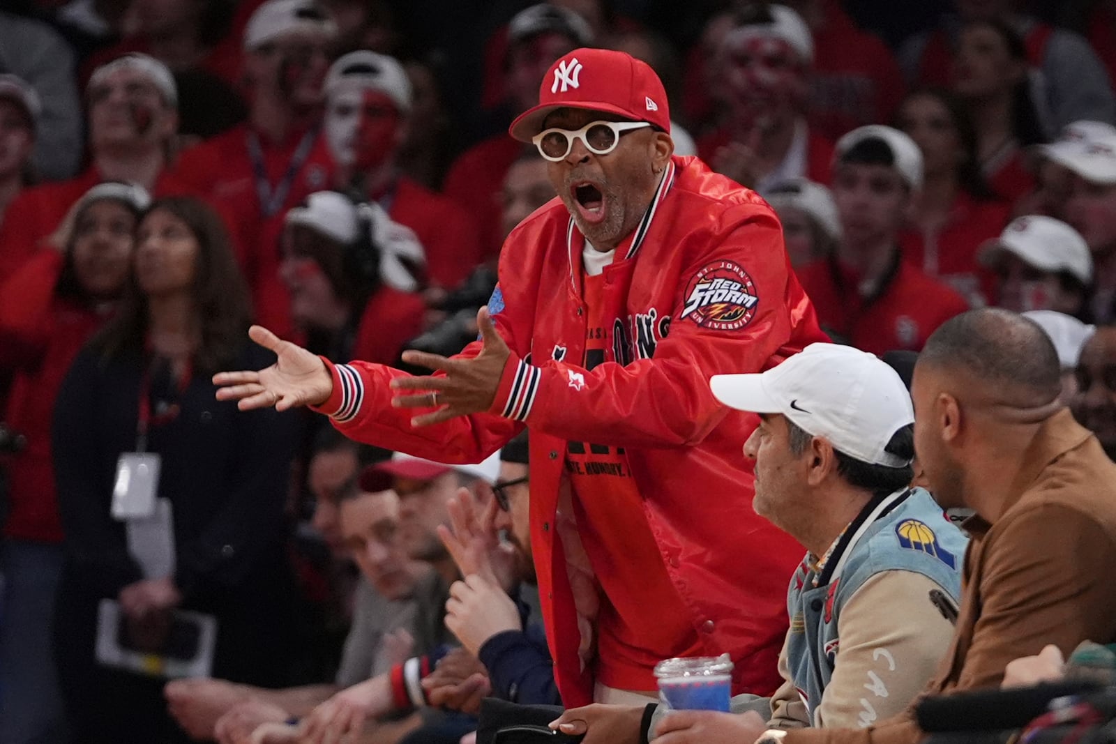 Spike Lee reacts to a call during the first half of an NCAA college basketball game between UConn and Creighton in the championship of the Big East Conference tournament Saturday, March 15, 2025, in New York. (AP Photo/Frank Franklin II)