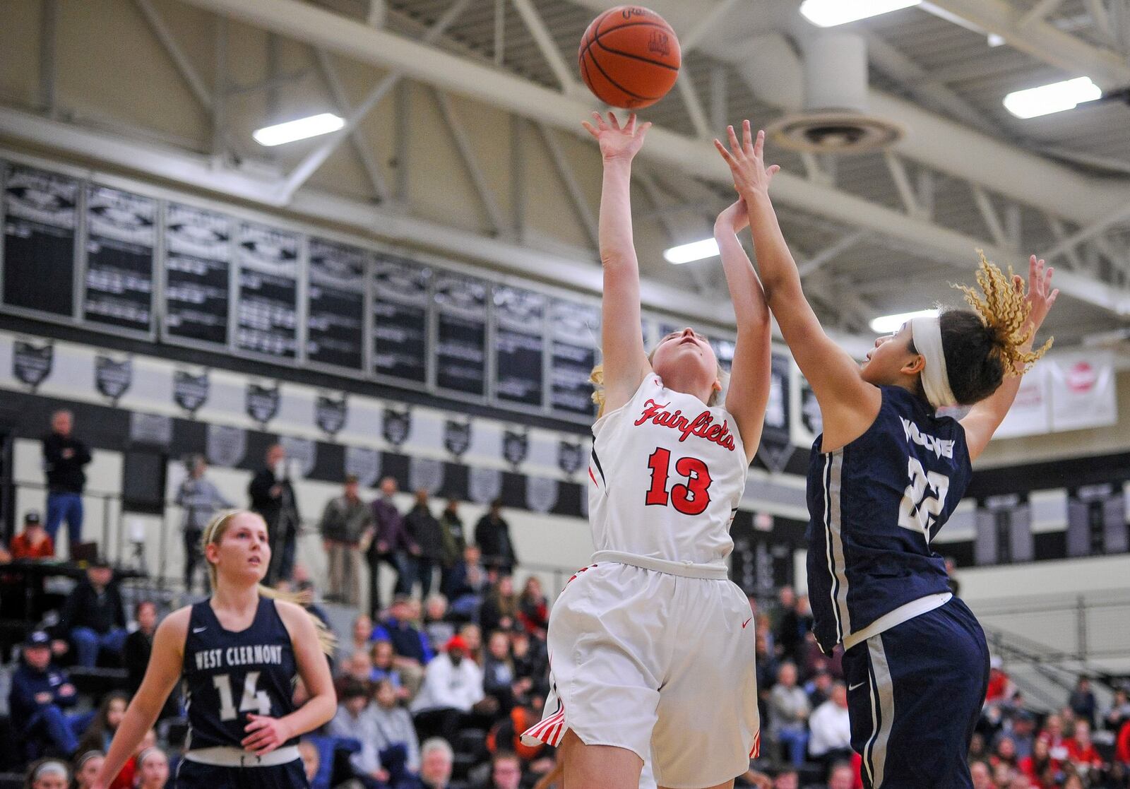 Fairfield’s Addie Kidd puts up a shot defended by West Clermont’s Kendall Hale during their Division I sectional game Wednesday night at Lakota East. West Clermont won 61-56 in overtime. NICK GRAHAM/STAFF