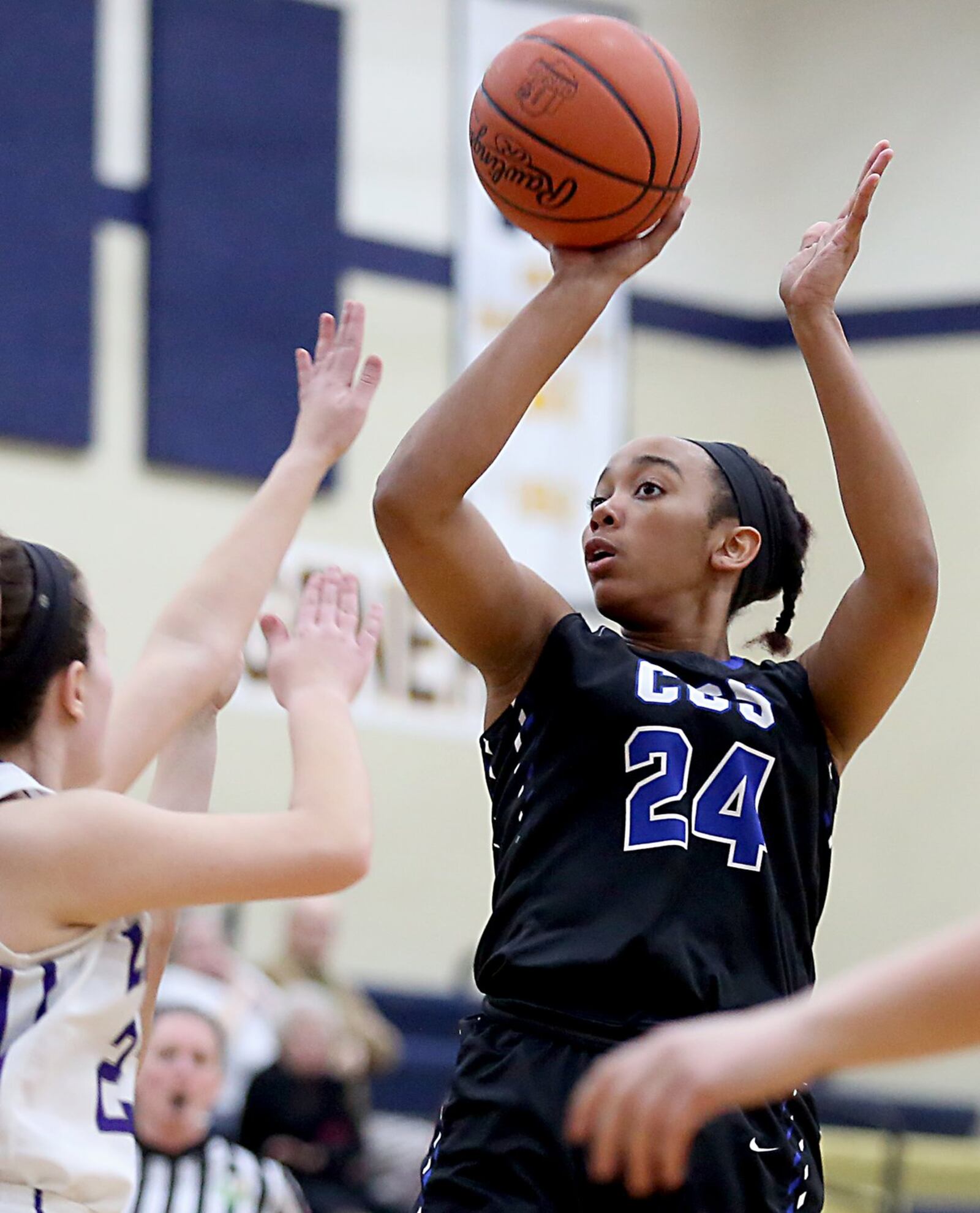 Cincinnati Christian guard Lyric Harris elevates for a jumper during Tuesday night’s Division IV sectional game against Miami Valley Christian Academy at Monroe. CONTRIBUTED PHOTO BY E.L. HUBBARD