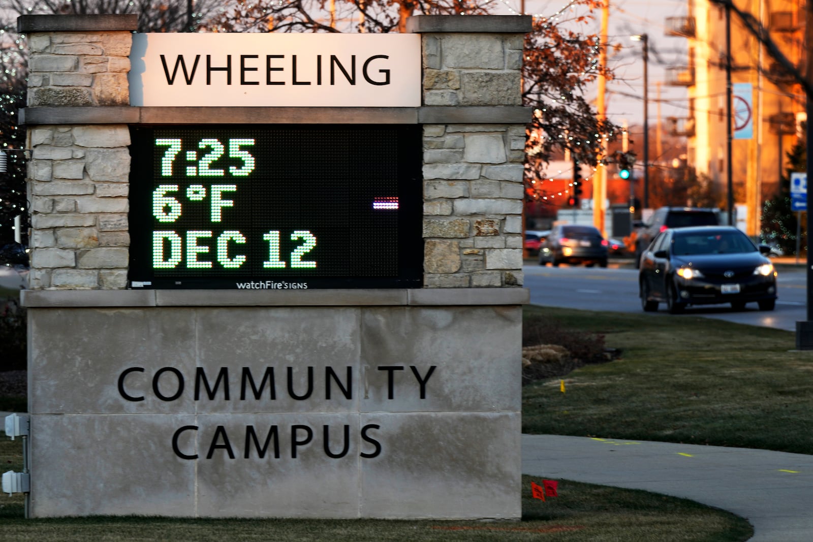 A sign shows the current outdoor temperature in the Chicago suburb of Wheeling, Ill., Thursday, Dec. 12, 2024. (AP Photo/Nam Y. Huh)