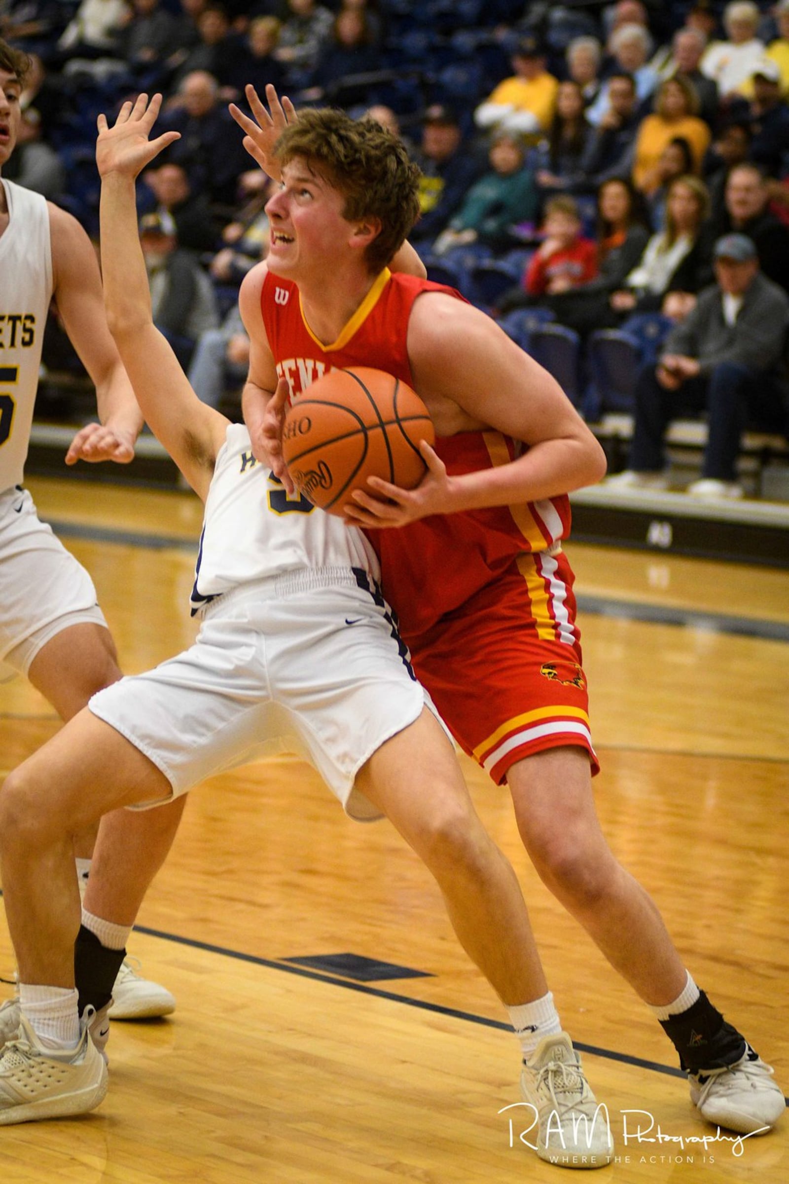 Fenwick’s A.J. Braun (20) shows some determination around the basket during Wednesday night’s Division II sectional basketball game against Monroe at Fairmont’s Trent Arena. Fenwick won 60-39. ROB MCCULLEY/RAM PHOTOGRAPHY